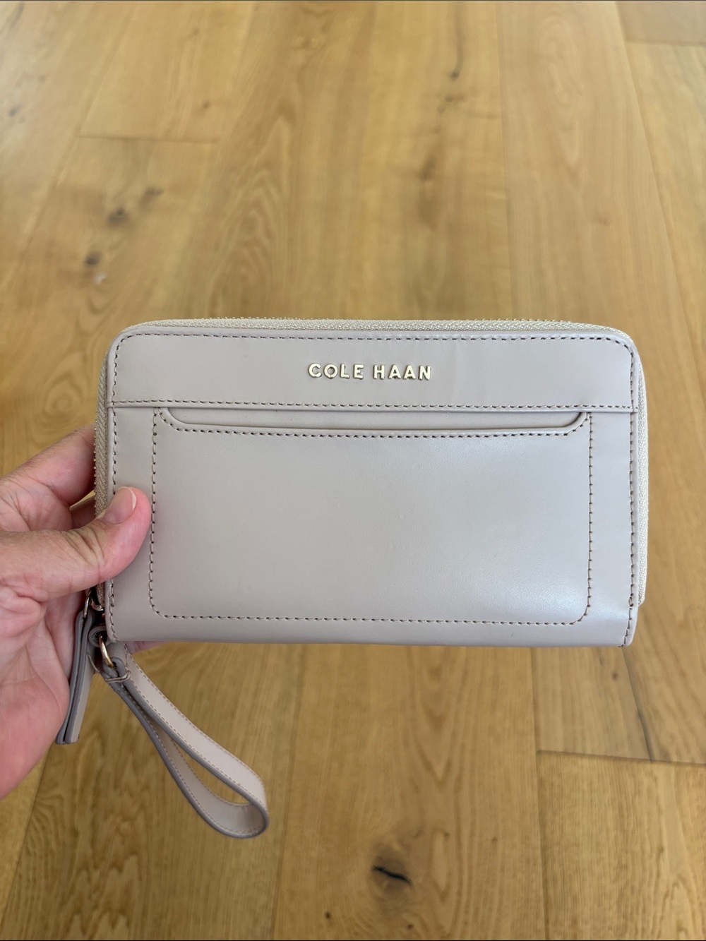 Cole Haan Pebbled Leather Wristlet in Light Beige/ Canyon Rose